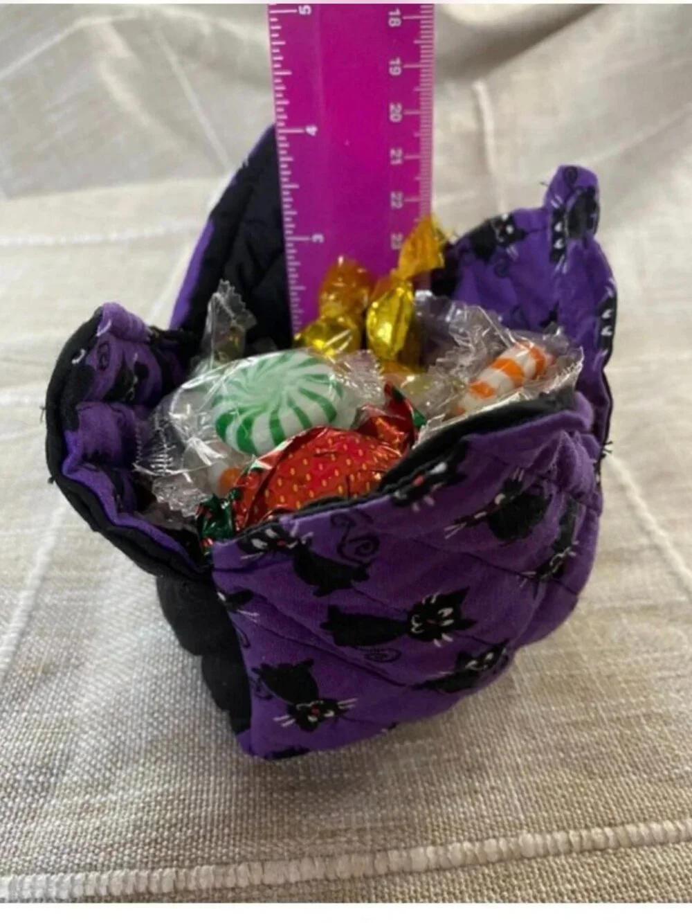 2 Fabric baskets, black cats, and Halloween placemat centerpiece